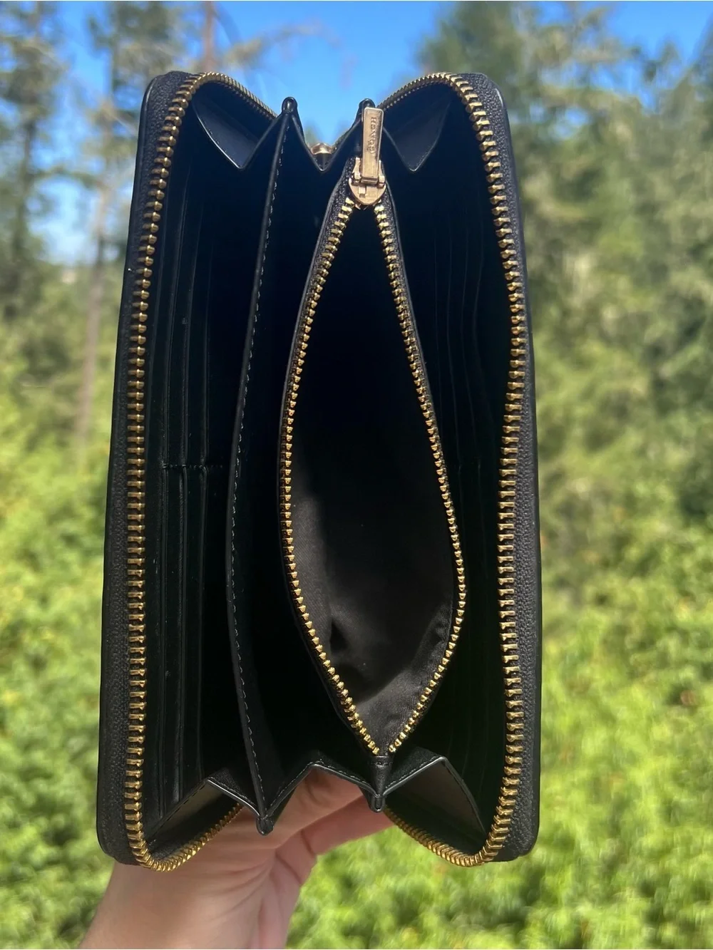Coach accordion zip